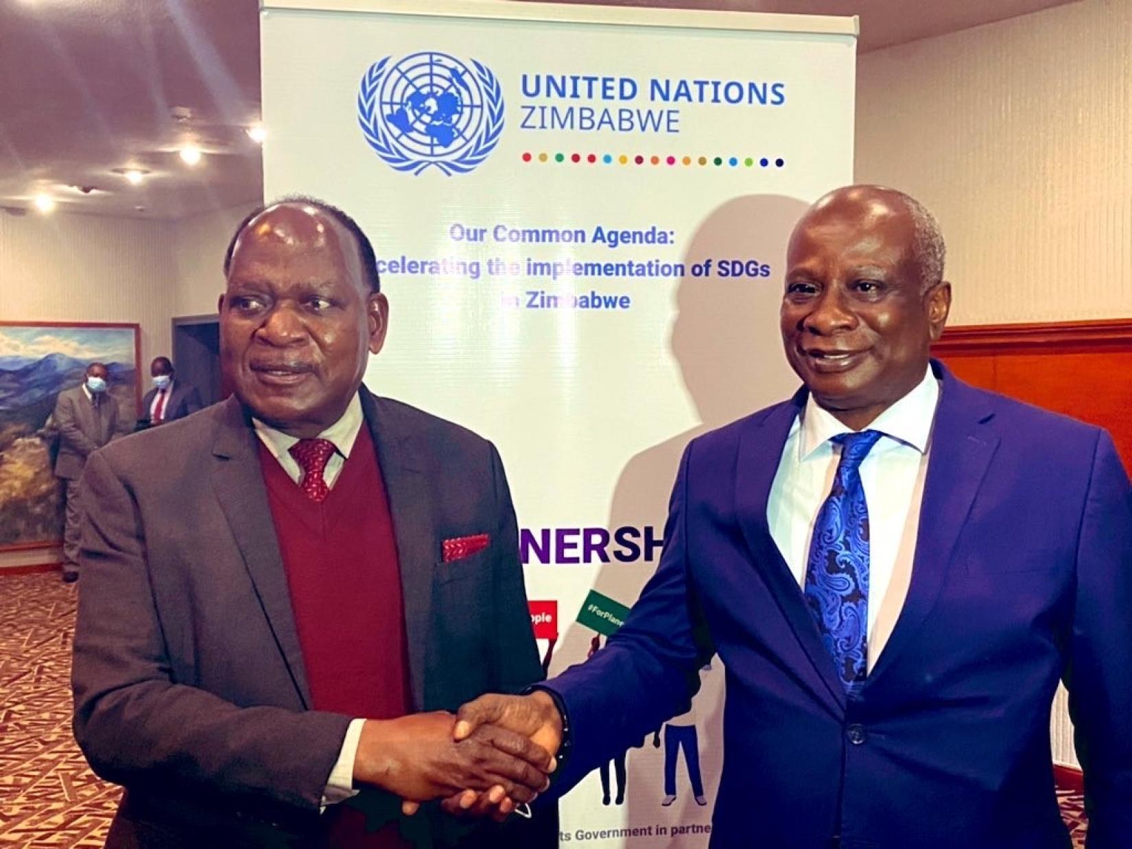 (l-r)Chief Secretary to President and Cabinet Dr M J M Sibanda and UN Resident and Humanitarian Coordinator Mr Edward Kallon