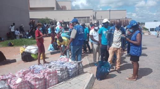 COVID-19 affected returning migrants receive post arrival support